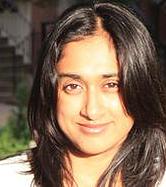 Headshot of Vinaya Saunders with soft amile